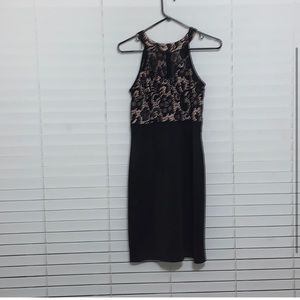 Black and blush colored midi dress